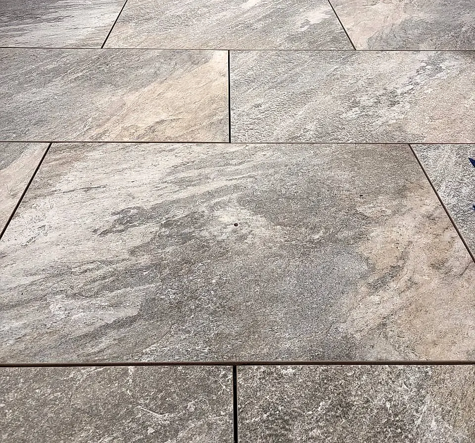 Stone-look porcelain paving detail with precise joints